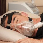 Fig 3 - Continuous positive airway pressure (CPAP) machine in use