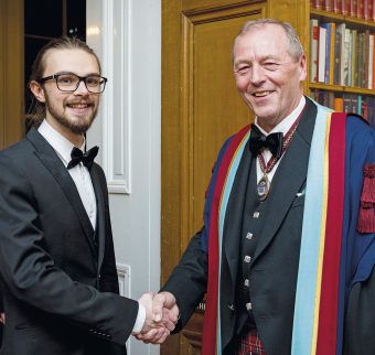 Competition winner David Cobbett with Professor Fraser McDonald