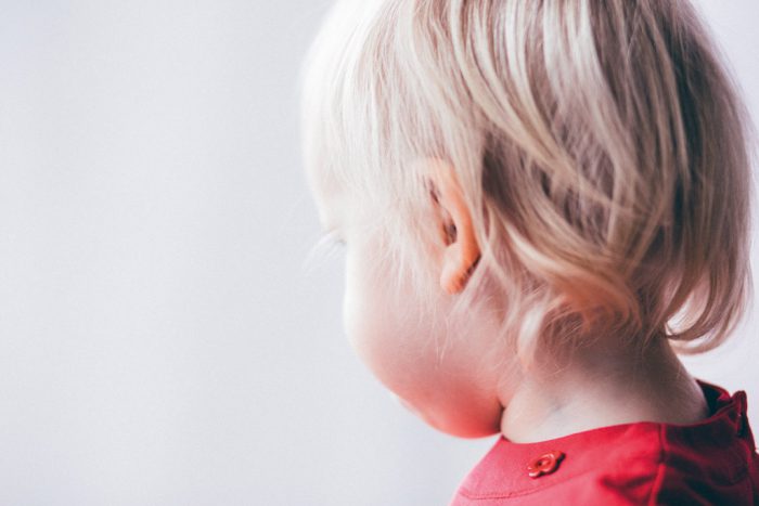Child looking away from camera