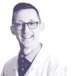 A head and shoulders image of Dr Paul O'D'wyer in his lab coat