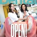 The cover of the autumn issue of Ireland's Dental, with a picture showing two women being shown between a top and bottom jaw model.