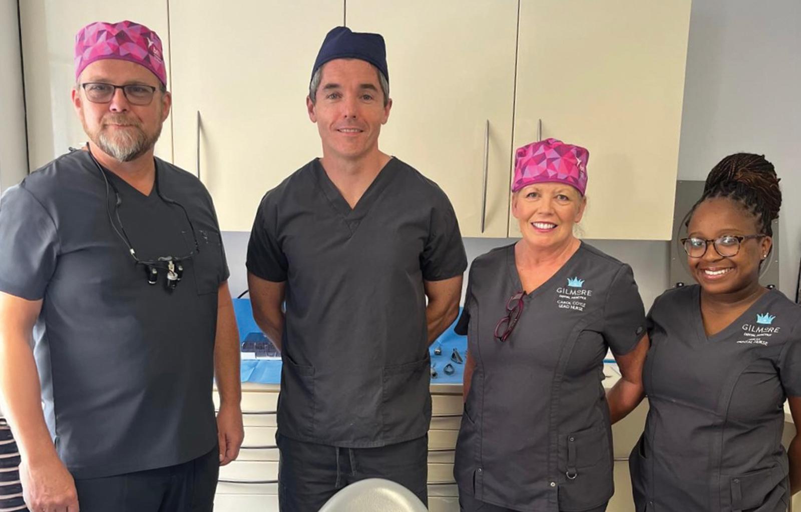 Dr Anthony James with
Dr Callum Graham (left),
colleagues Carol Coyle
and Alicia Chirara, pose for a group picture in surgery.
