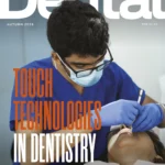 Touch Technologies in dentistry, this month's cover line sits over an image of a dentist at work on a patient.